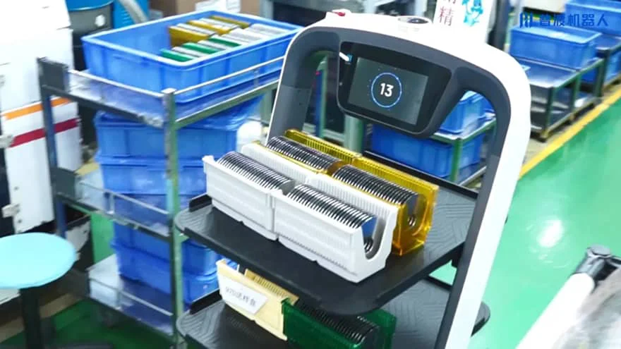 robot delivering equipment to a worker