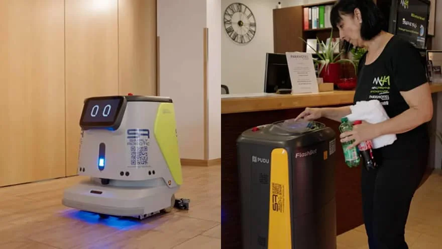robot and hotel staff