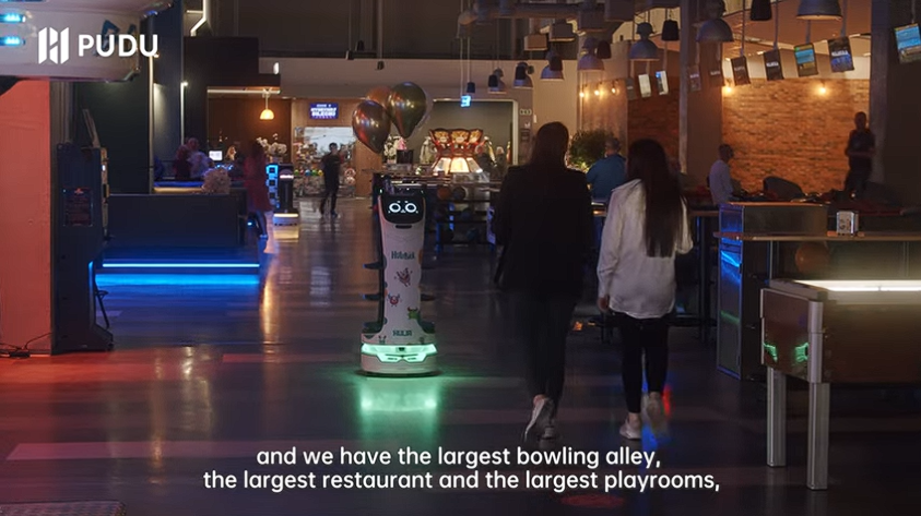 robto in a bowling alley