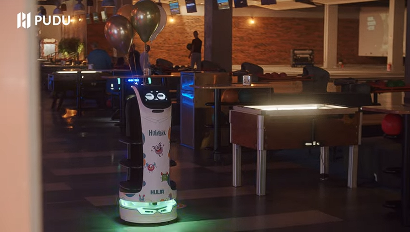 robot delivering balloons