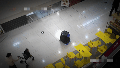 pudu robot in airport terminal